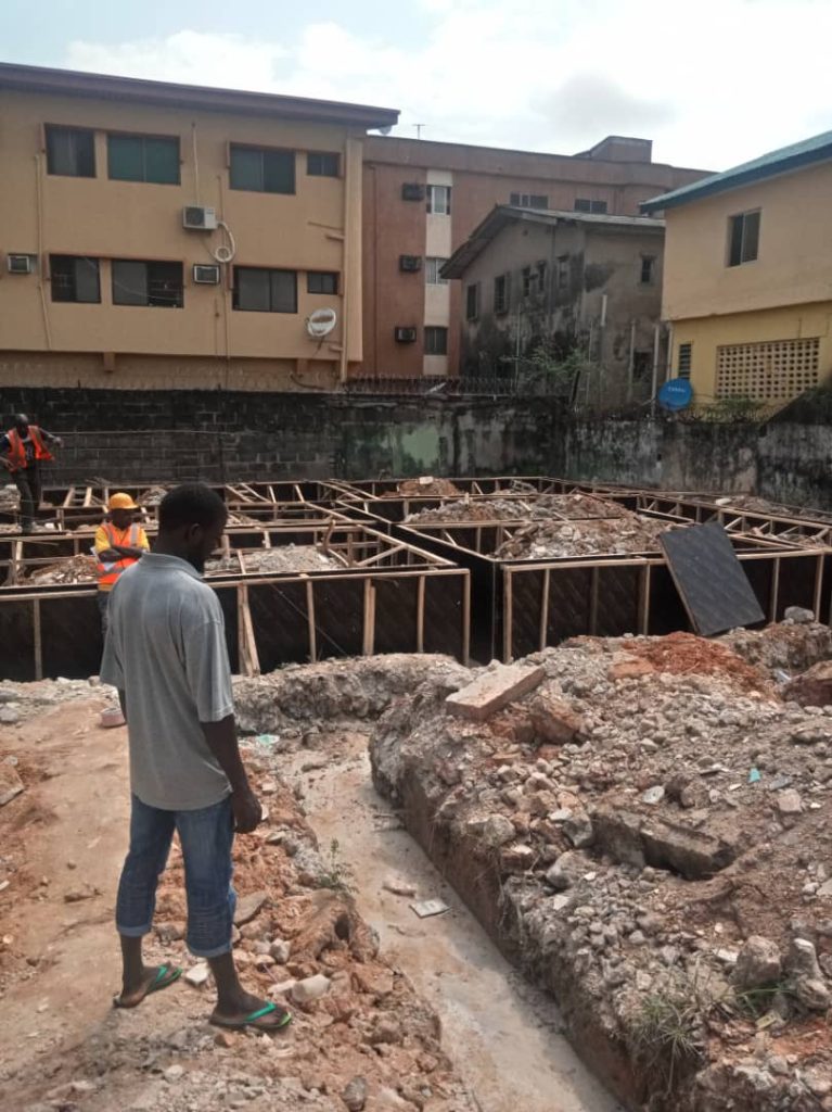 Building contractors in Lagos preparing foundation for new home construction