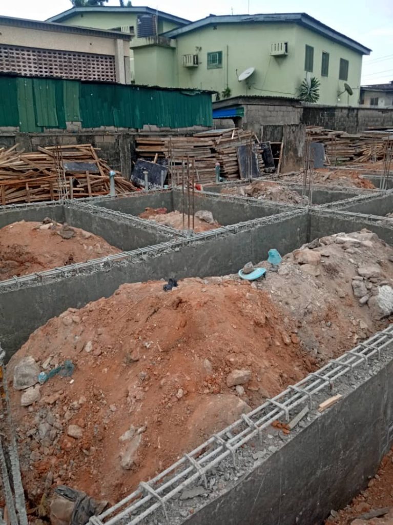 Bricklaying and roofing for affordable housing project in rural Nigeria