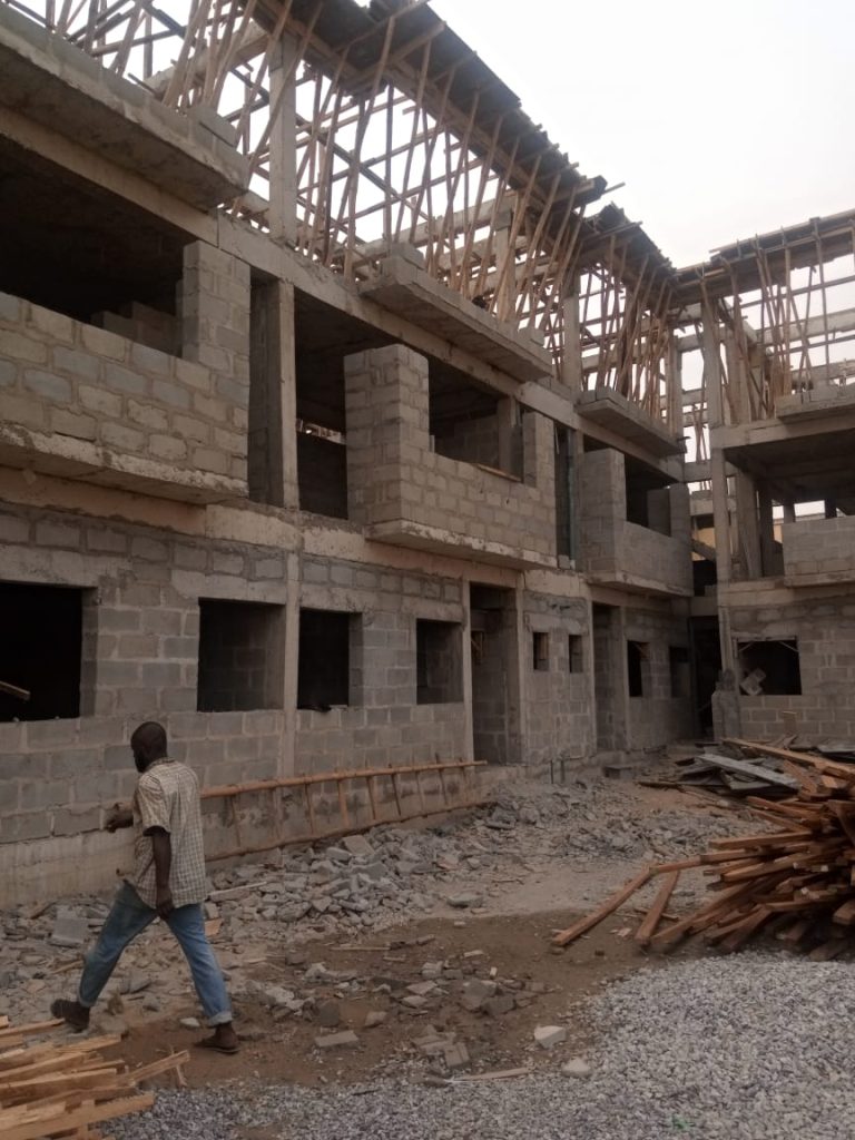 Top construction company in Nigeria supervising a multi-storey building project